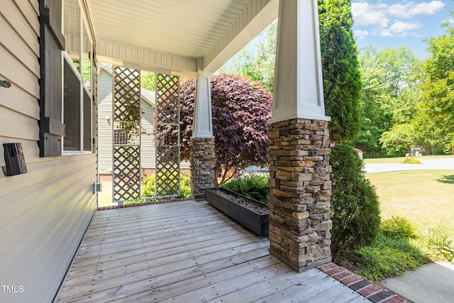 71 Potted Plant Ct, Clayton, NC 27520 - wooden deck with a porch