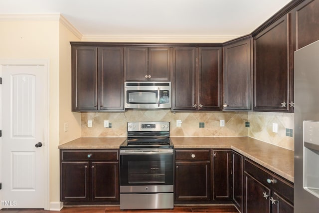 71 Potted Plant Ct, Clayton, NC 27520 - kitchen featuring crown molding, decorative backsplash, dark brown cabinetry, and stainless steel appliances