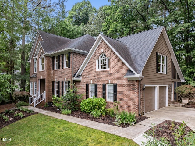 view of front facade featuring an attached garage, roof with shingles, concrete driveway, and brick siding