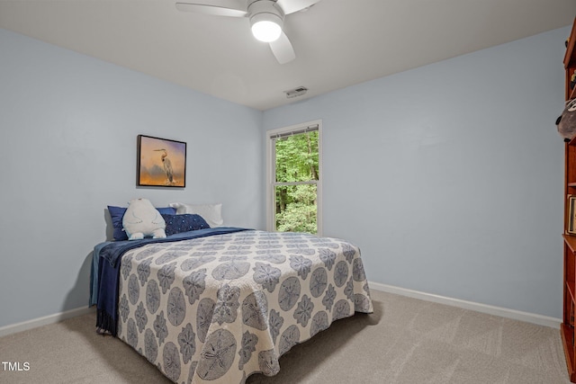 bedroom featuring baseboards, carpet, and a ceiling fan