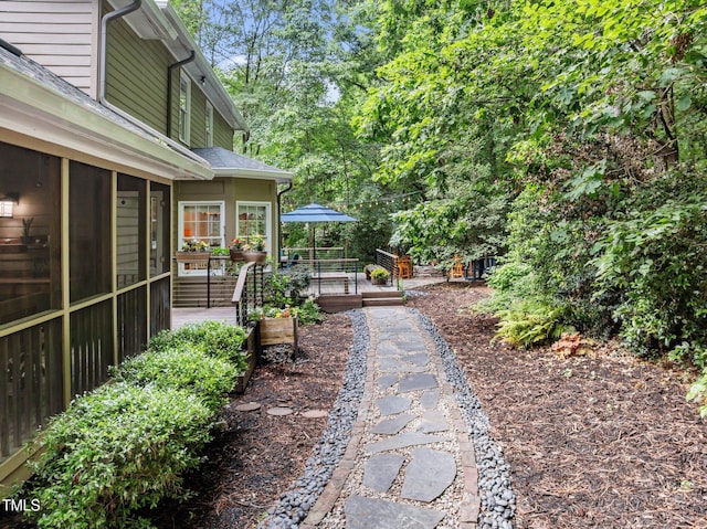 view of yard with a wooden deck