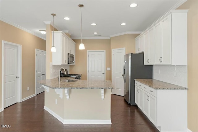 225 Gulley Glen Dr, Garner, NC 27529 - kitchen with white cabinetry, backsplash, a peninsula, and appliances with stainless steel finishes