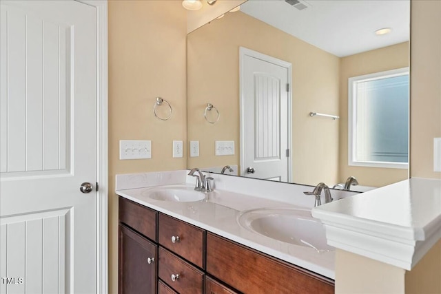 225 Gulley Glen Dr, Garner, NC 27529 - full bathroom featuring double vanity, a sink, and visible vents