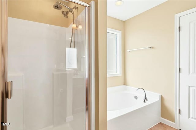 225 Gulley Glen Dr, Garner, NC 27529 - bathroom featuring a garden tub and a stall shower