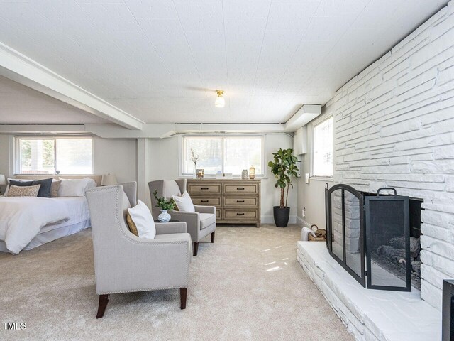 3818 Hillgrand Dr, Durham, NC 27705 - living area with a fireplace and light colored carpet