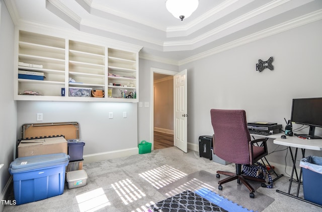 home office featuring baseboards, ornamental molding, carpet, and a tray ceiling
