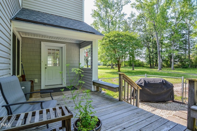 deck featuring a grill