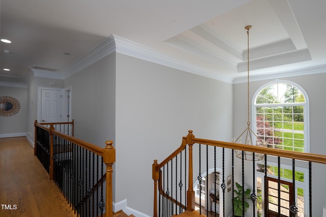 139 Stonebridge Dr, New London, NC 28127 - hall featuring ornamental molding, an upstairs landing, and wood finished floors