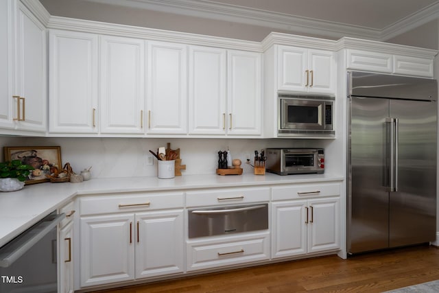 139 Stonebridge Dr, New London, NC 28127 - kitchen featuring built in appliances, a toaster, a warming drawer, and white cabinets