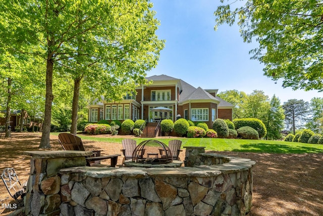 139 Stonebridge Dr, New London, NC 28127 - back of property featuring stairway, a patio area, a sunroom, and a lawn