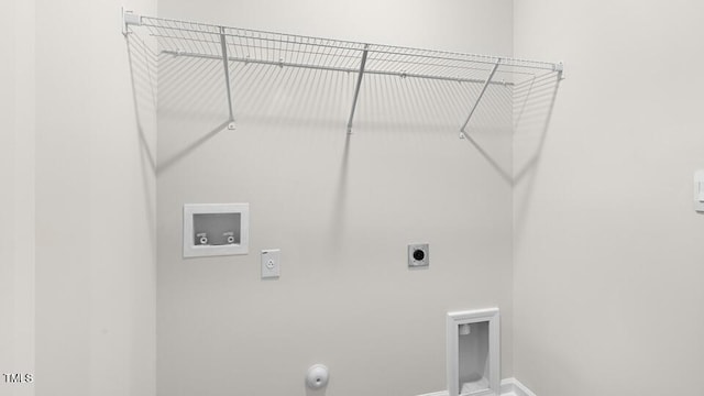 404 Ember St, Sanford, NC 27330 - laundry room with laundry area, hookup for a gas dryer, baseboards, electric dryer hookup, and washer hookup