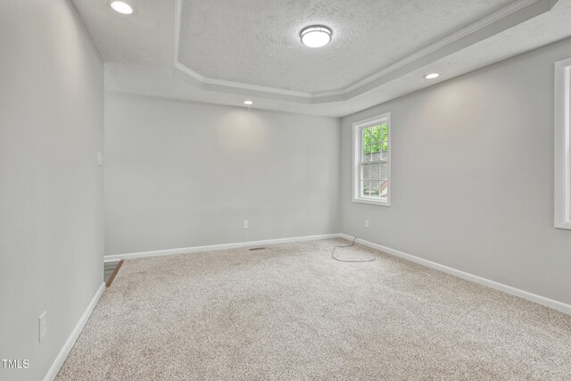 108 Carmichael Ln, Spring Lake, NC 28390 - carpeted empty room featuring baseboards, recessed lighting, a raised ceiling, and a textured ceiling