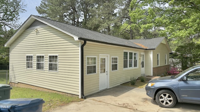 1011 Wyldewood Rd, Durham, NC 27704 - view of side of home with a shingled roof