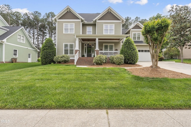 925 Hidden Jewel Ln, Wake Forest, NC 27587 - craftsman-style home featuring covered porch, concrete driveway, a front lawn, and an attached garage