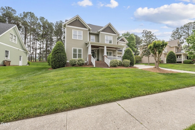 925 Hidden Jewel Ln, Wake Forest, NC 27587 - view of front of property with a porch and a front lawn