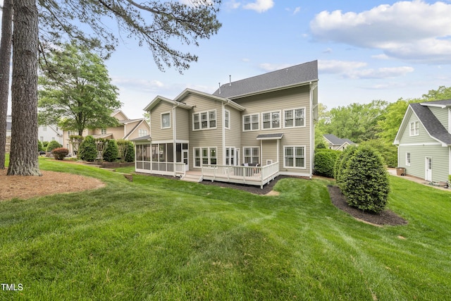 925 Hidden Jewel Ln, Wake Forest, NC 27587 - back of property featuring a lawn, a sunroom, and a wooden deck