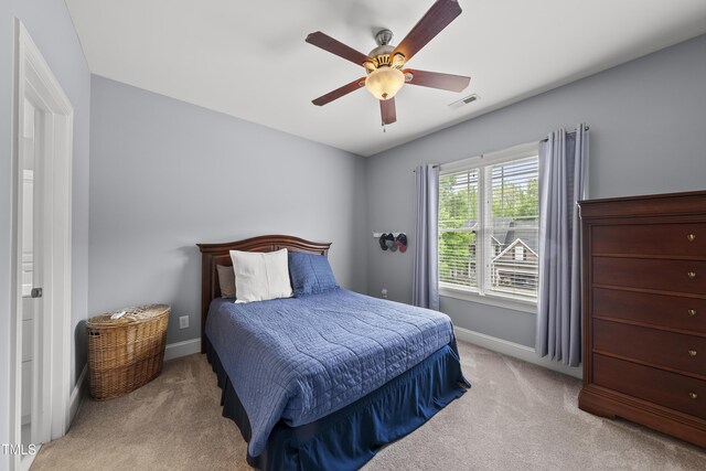 925 Hidden Jewel Ln, Wake Forest, NC 27587 - carpeted bedroom featuring baseboards and ceiling fan