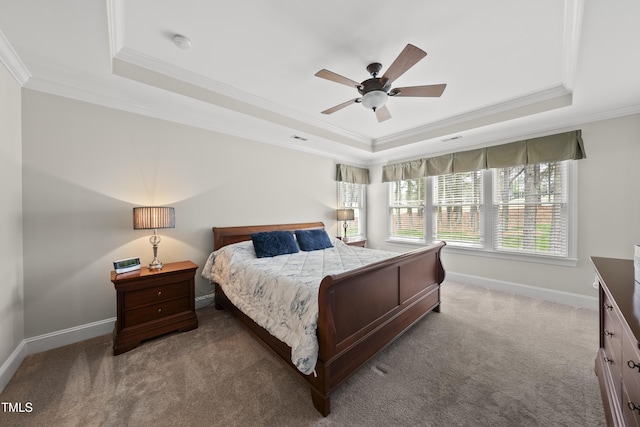925 Hidden Jewel Ln, Wake Forest, NC 27587 - carpeted bedroom with a tray ceiling, ornamental molding, baseboards, and ceiling fan