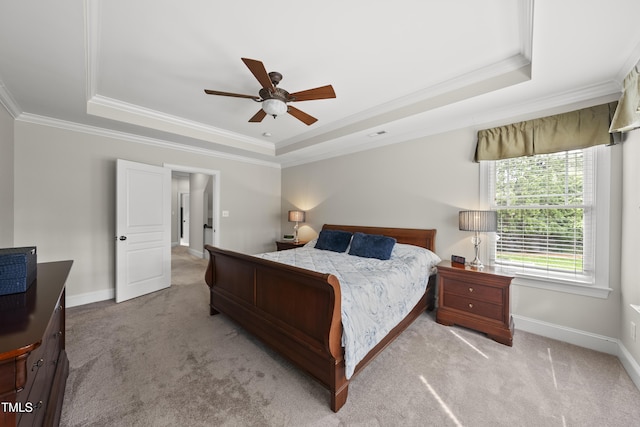 925 Hidden Jewel Ln, Wake Forest, NC 27587 - bedroom featuring a tray ceiling, ornamental molding, carpet floors, and baseboards