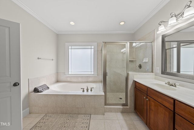 925 Hidden Jewel Ln, Wake Forest, NC 27587 - bathroom featuring tile patterned floors, a stall shower, vanity, a garden tub, and crown molding