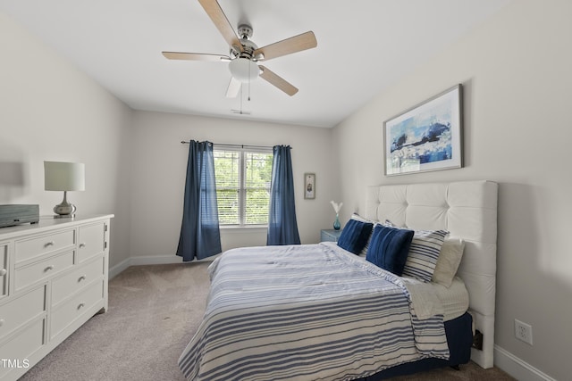 925 Hidden Jewel Ln, Wake Forest, NC 27587 - bedroom with light carpet, baseboards, and a ceiling fan