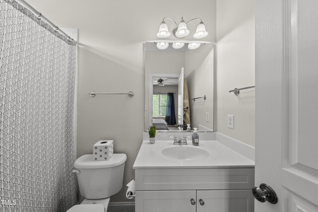 925 Hidden Jewel Ln, Wake Forest, NC 27587 - full bathroom with toilet, vanity, a ceiling fan, and curtained shower