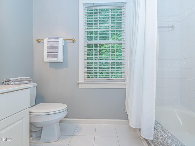 5401 Fire Pink Way, Raleigh, NC 27613 - full bathroom with vanity, toilet, tile patterned floors, shower / tub combo with curtain, and baseboards