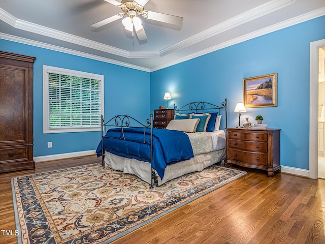 5401 Fire Pink Way, Raleigh, NC 27613 - bedroom with wood finished floors, baseboards, crown molding, and a ceiling fan