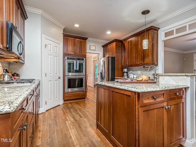 5401 Fire Pink Way, Raleigh, NC 27613 - kitchen with appliances with stainless steel finishes, light wood finished floors, decorative backsplash, ornamental molding, and light stone counters