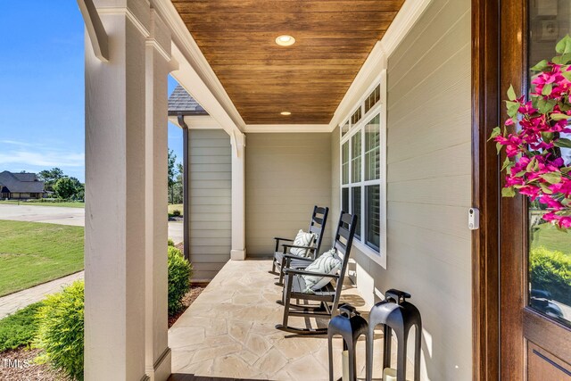 128 Paraggi Ct, Clayton, NC 27527 - view of patio / terrace featuring covered porch