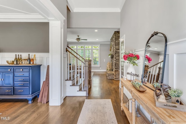 128 Paraggi Ct, Clayton, NC 27527 - foyer featuring crown molding, a ceiling fan, stairs, and wood finished floors