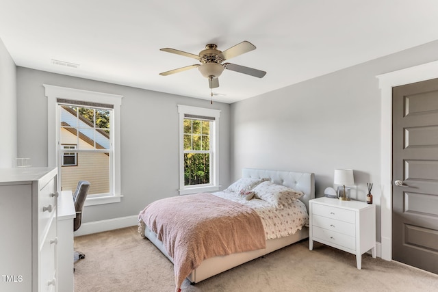 128 Paraggi Ct, Clayton, NC 27527 - bedroom with visible vents, light carpet, and multiple windows