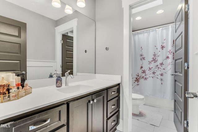 128 Paraggi Ct, Clayton, NC 27527 - full bath featuring vanity, tile patterned floors, and toilet