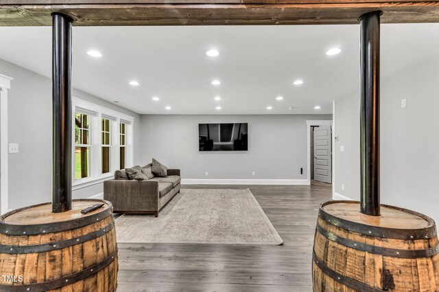 128 Paraggi Ct, Clayton, NC 27527 - living area featuring dark wood-type flooring, recessed lighting, and baseboards