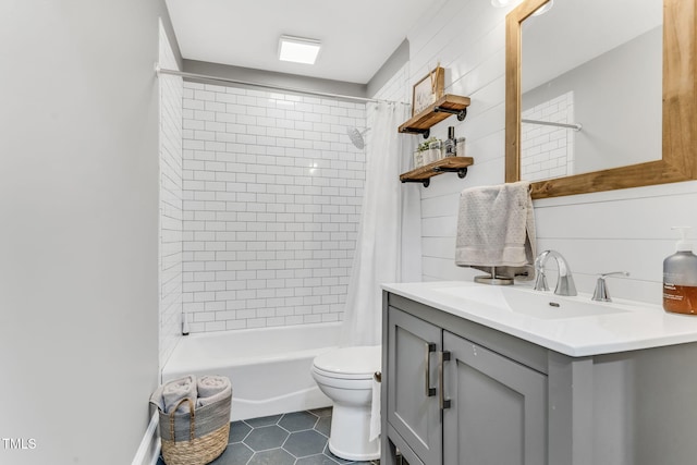 128 Paraggi Ct, Clayton, NC 27527 - bathroom featuring vanity, tile patterned floors, shower / bath combination with curtain, and toilet