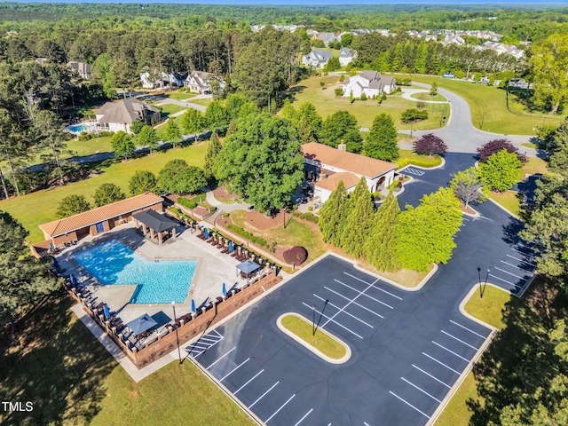 128 Paraggi Ct, Clayton, NC 27527 - drone / aerial view featuring a forest view