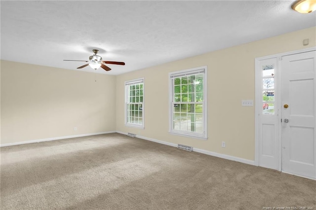 9701 Rockfish Rd, Fayetteville, NC 28376 - carpeted entrance foyer with a ceiling fan and baseboards