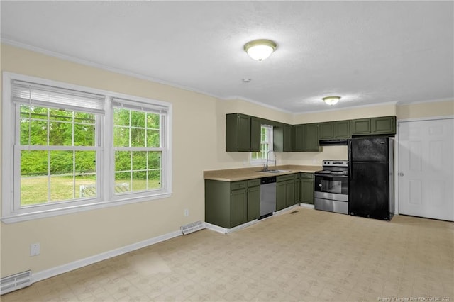 9701 Rockfish Rd, Fayetteville, NC 28376 - kitchen with green cabinets, stainless steel appliances, a sink, under cabinet range hood, and baseboards