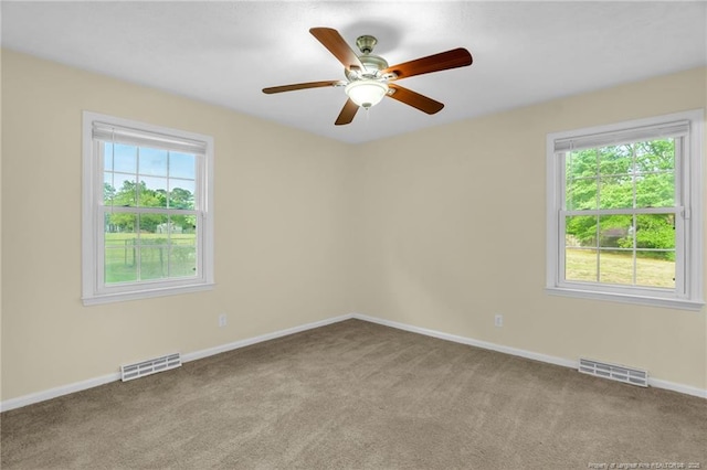 9701 Rockfish Rd, Fayetteville, NC 28376 - carpeted empty room featuring a ceiling fan and baseboards