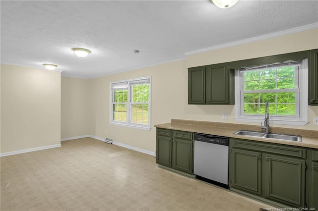 9701 Rockfish Rd, Fayetteville, NC 28376 - kitchen with green cabinetry, stainless steel dishwasher, a sink, ornamental molding, and baseboards