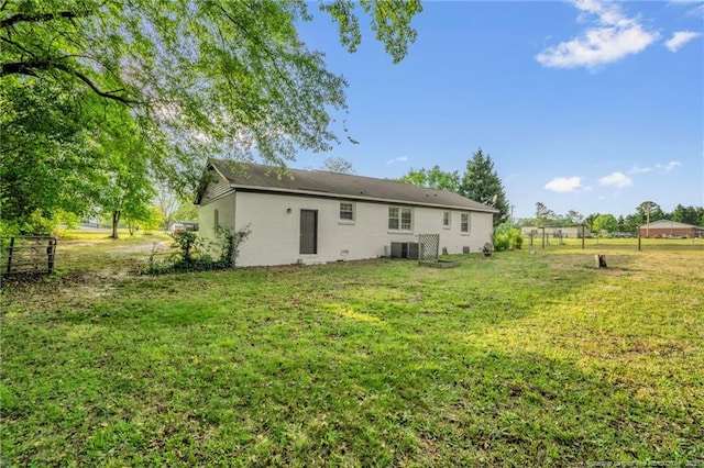9701 Rockfish Rd, Fayetteville, NC 28376 - rear view of property featuring central air condition unit