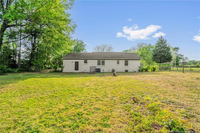 9701 Rockfish Rd, Fayetteville, NC 28376 - back of property featuring a lawn