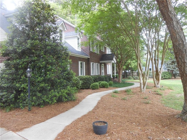600 Yorkshire Pl, Lumberton, NC 28358 - view of home's exterior with brick siding and a shingled roof