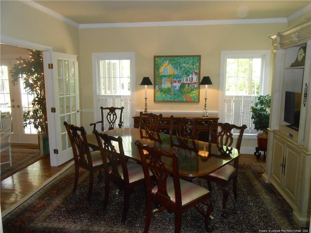 600 Yorkshire Pl, Lumberton, NC 28358 - dining space featuring crown molding, wood finished floors, and a healthy amount of sunlight