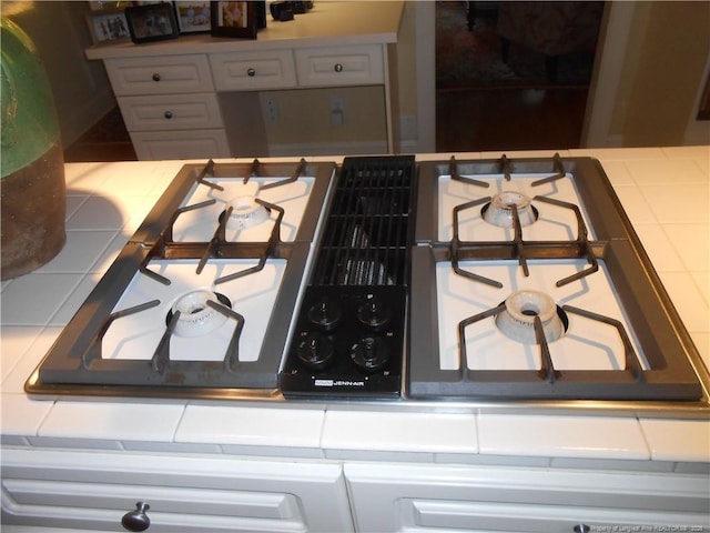 600 Yorkshire Pl, Lumberton, NC 28358 - details with tile countertops and white cabinetry