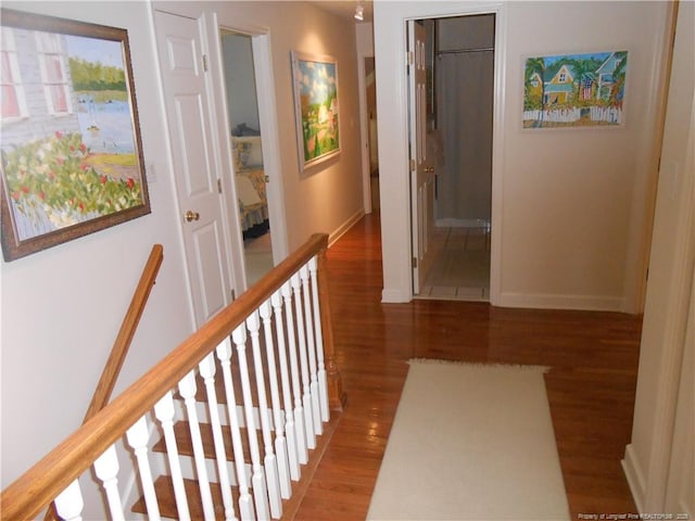 600 Yorkshire Pl, Lumberton, NC 28358 - corridor featuring an upstairs landing, baseboards, and wood finished floors