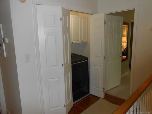 600 Yorkshire Pl, Lumberton, NC 28358 - clothes washing area with dark wood-style flooring and cabinet space