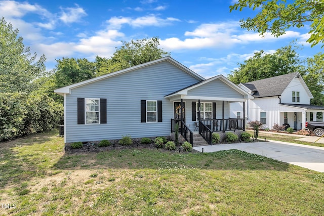 view of front of home with a porch and a front lawn