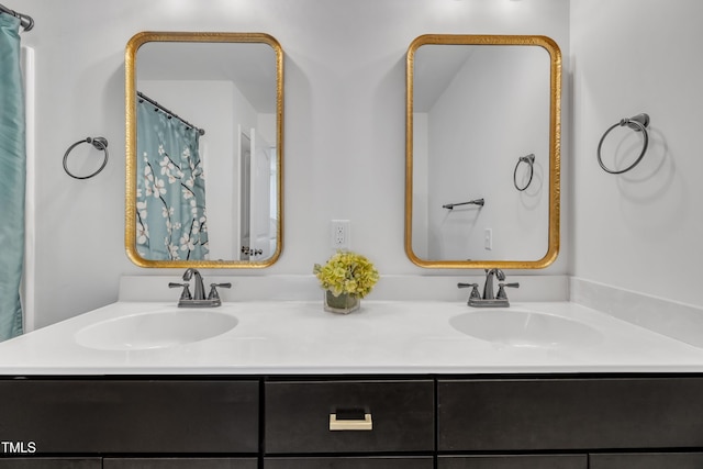 full bath with double vanity and a sink