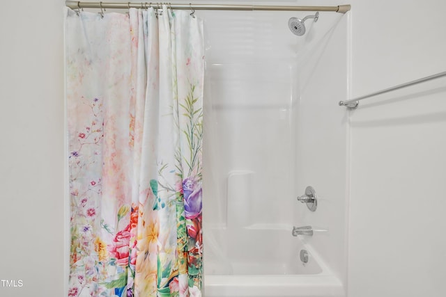 bathroom featuring shower / bath combination with curtain